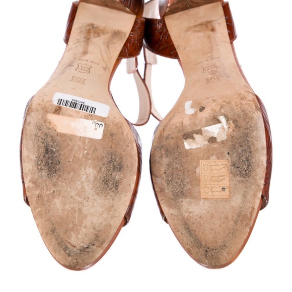 Escada Leather Sandals
Brown
Wrap-Around Straps & Buckle Closure at Ankles - Picture 5 of 5